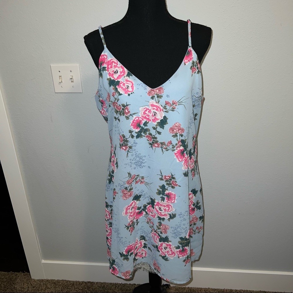 Francesca’s blue floral dress